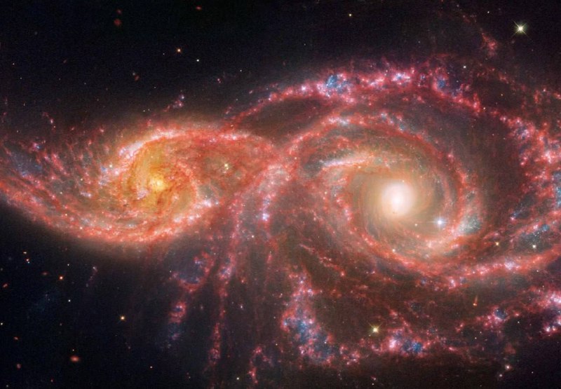 Галактические столкновения: пара галактик IC 2163 и NGC 2207
